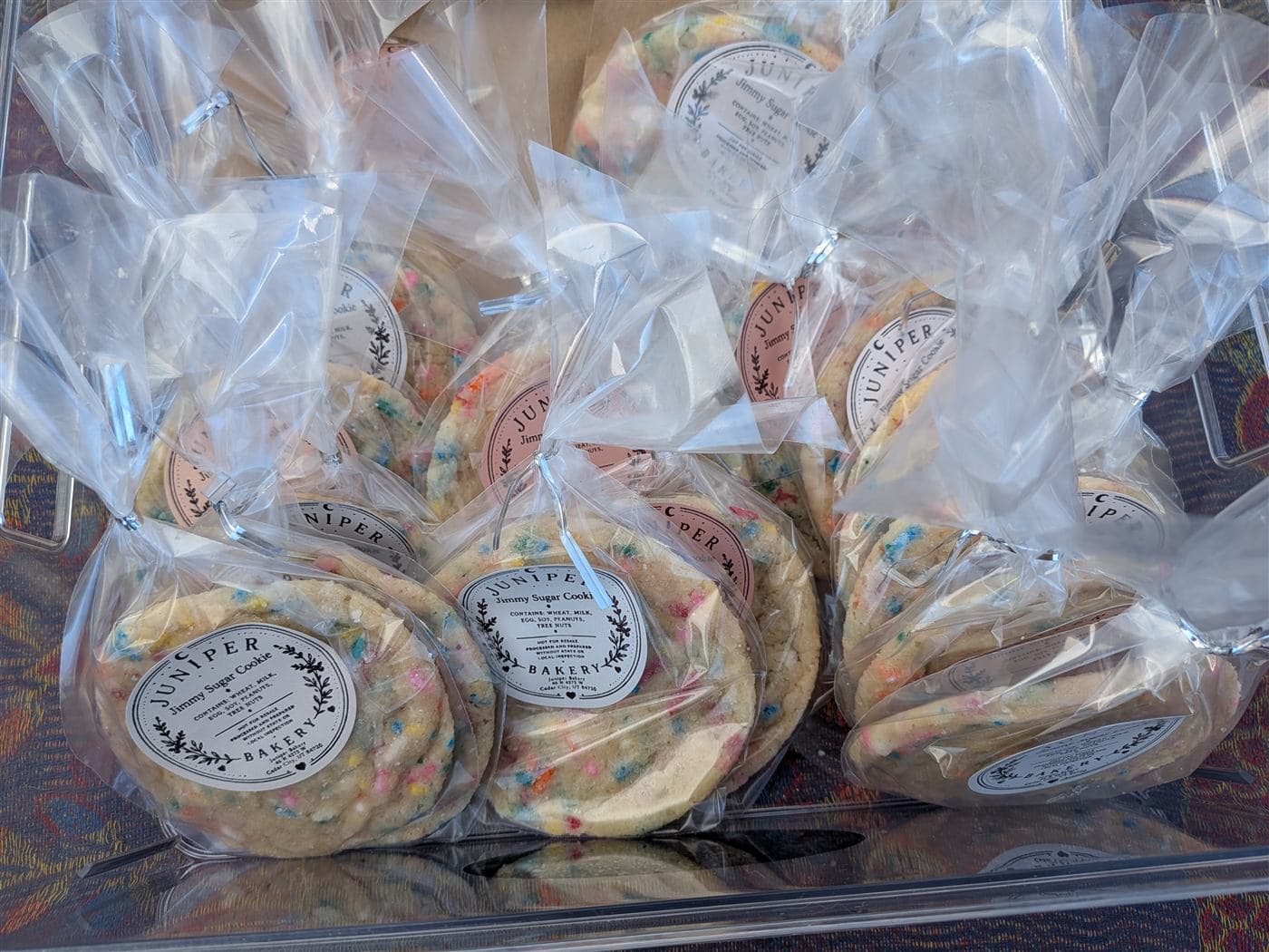 Bagged Jimmy sugar cookies in a market bin